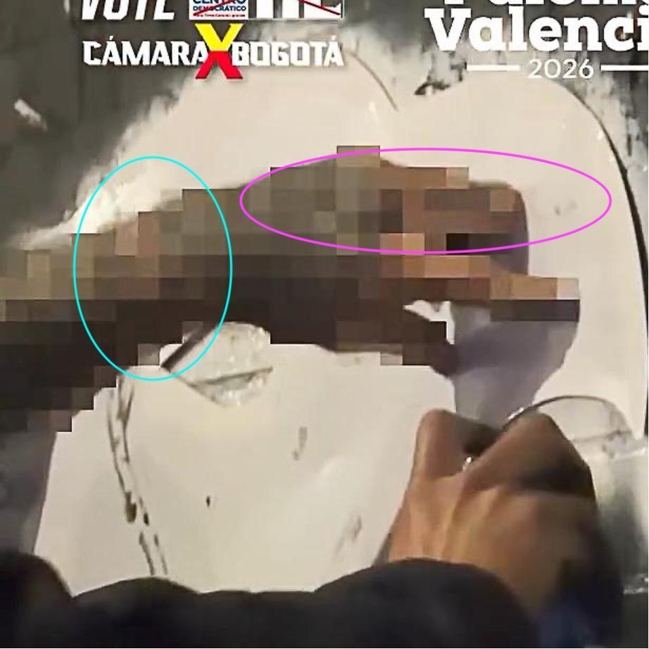 Detalle de una mano pixelada en el video